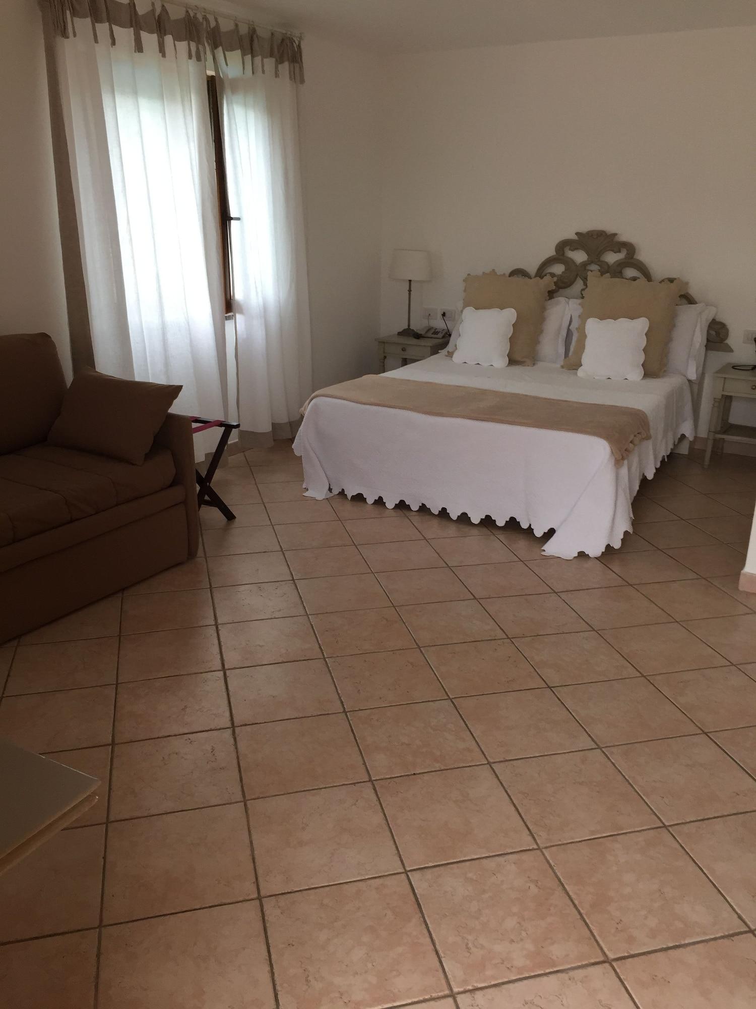 Relais Fenicottero Rosa Guest House Porto Taverna Luaran gambar