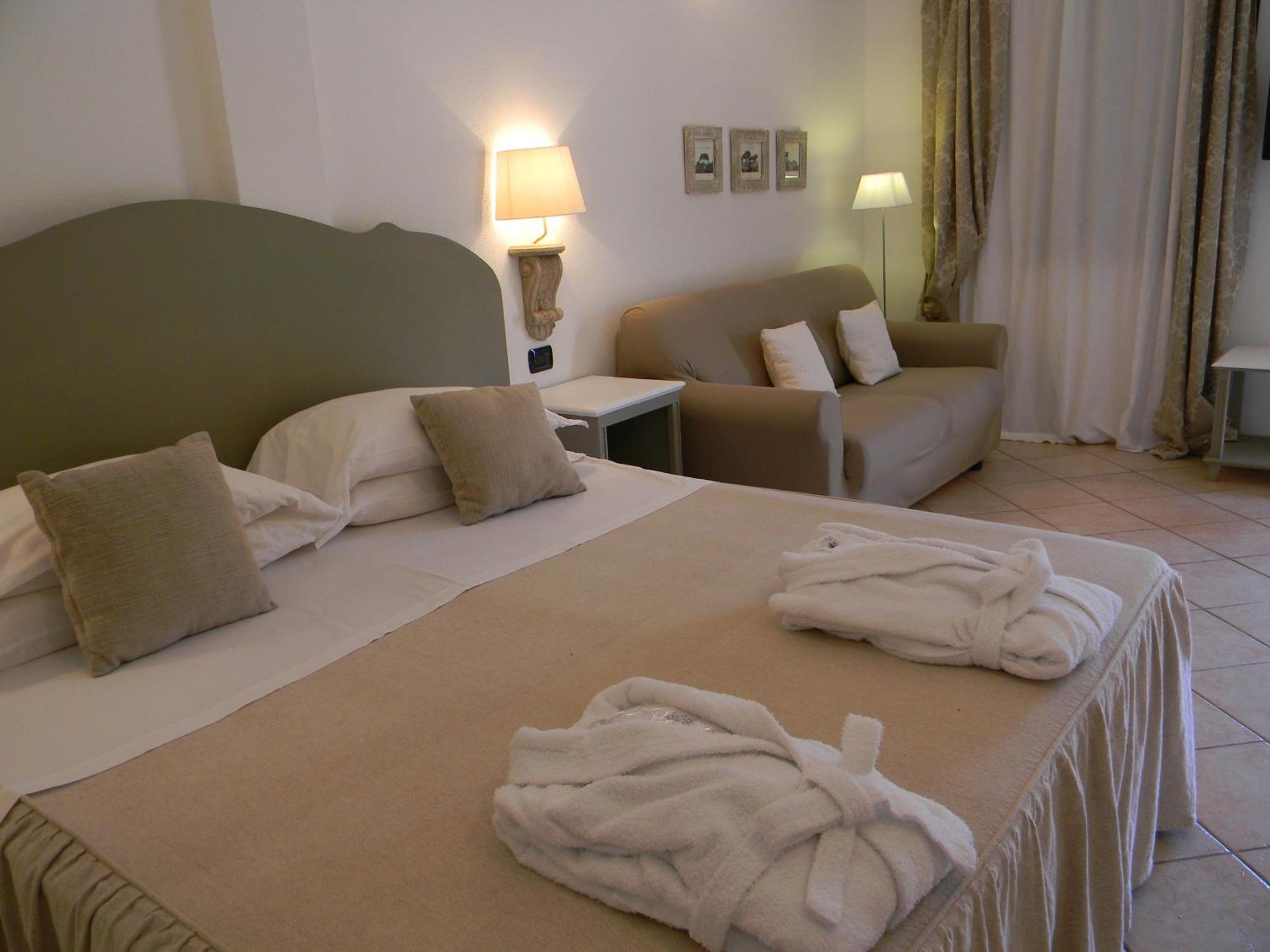 Relais Fenicottero Rosa Guest House Porto Taverna Bilik gambar